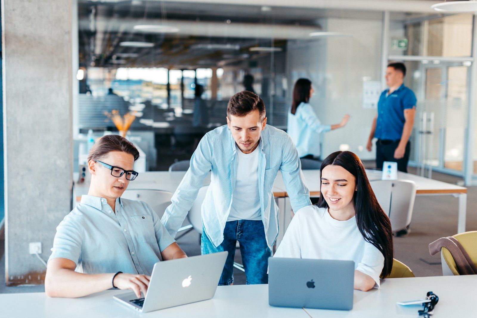 Consultants working together at a desk